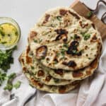 Light and fluffy, herbed garlic butter naan