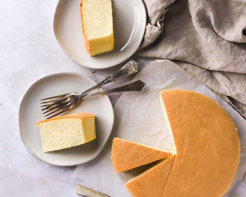 cotton soft sponge cake with slices on plates